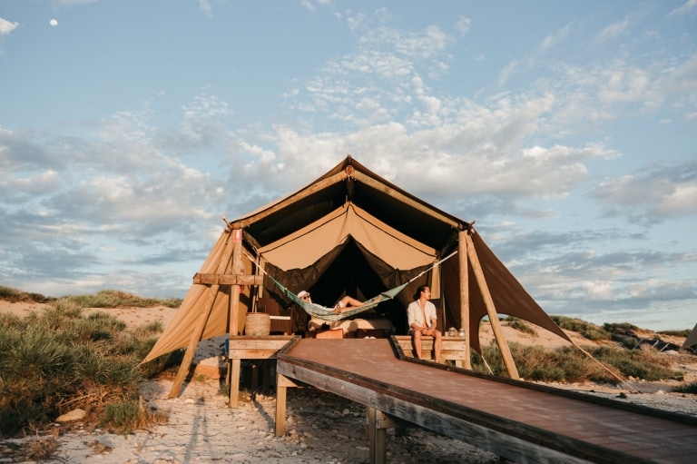Couple walking through the beautifully appointed lounge area of Southern Ocean Lodge, Kangaroo Island, South Australia © South Australian Tourism Commission
