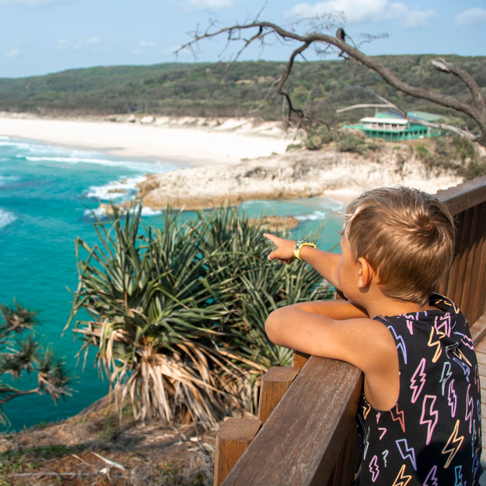 Boy pointing at the water on the North Gorge Walk © Tourism and Events Queensland