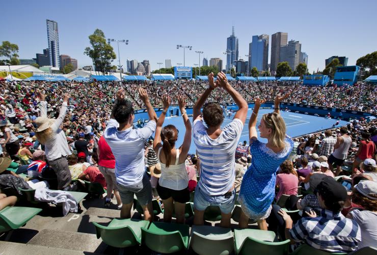 A view of the crowd cheering at a tennis match at the Australian Open, Melbourne, Victoria © Visit Victoria