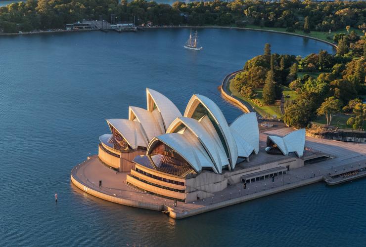 Aerial view over Sydney Opera House and the edge of the Royal Botanic Gardens in Sydney, New South Wales © Cultural Attractions of Australia