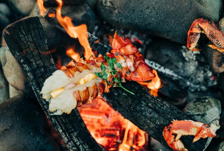 Lobster and crab cooking over an open fire at Kittawa Lodge, King Island, Tasmania © Kittawa Lodge/Adam Gibson